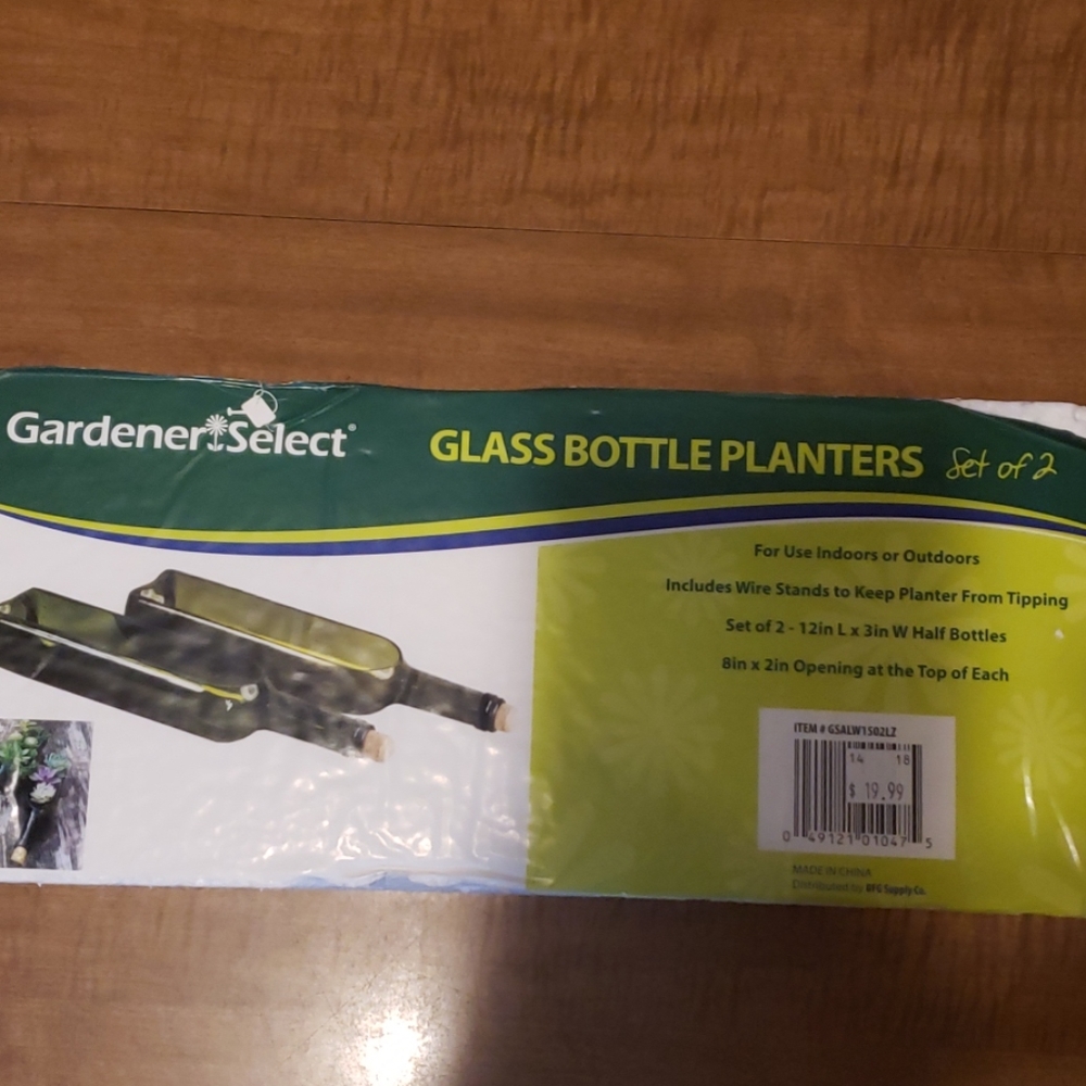 Glass wine bottle planters